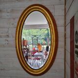Miroir ovale doré