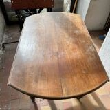 Round drop-leaf table