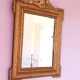 Napoleon III mirror with rich gilded ornamentation