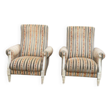 2 Louis XVI bergère armchairs in solid wood with beige and blue embroidered fabric.