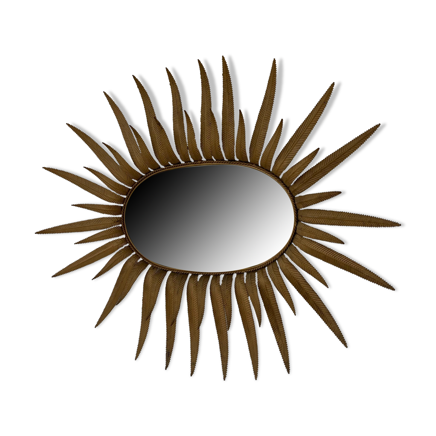 Vintage copper metal sun mirror oval shaped from the 1960s