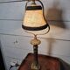 Empire-style table lamp in gilded bronze from the 19th century.
