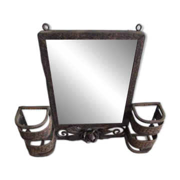 Art Deco wall-mounted brush holder mirror in wrought iron.