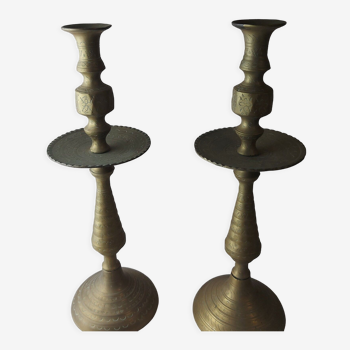 Pair of old engraved brass candle holders