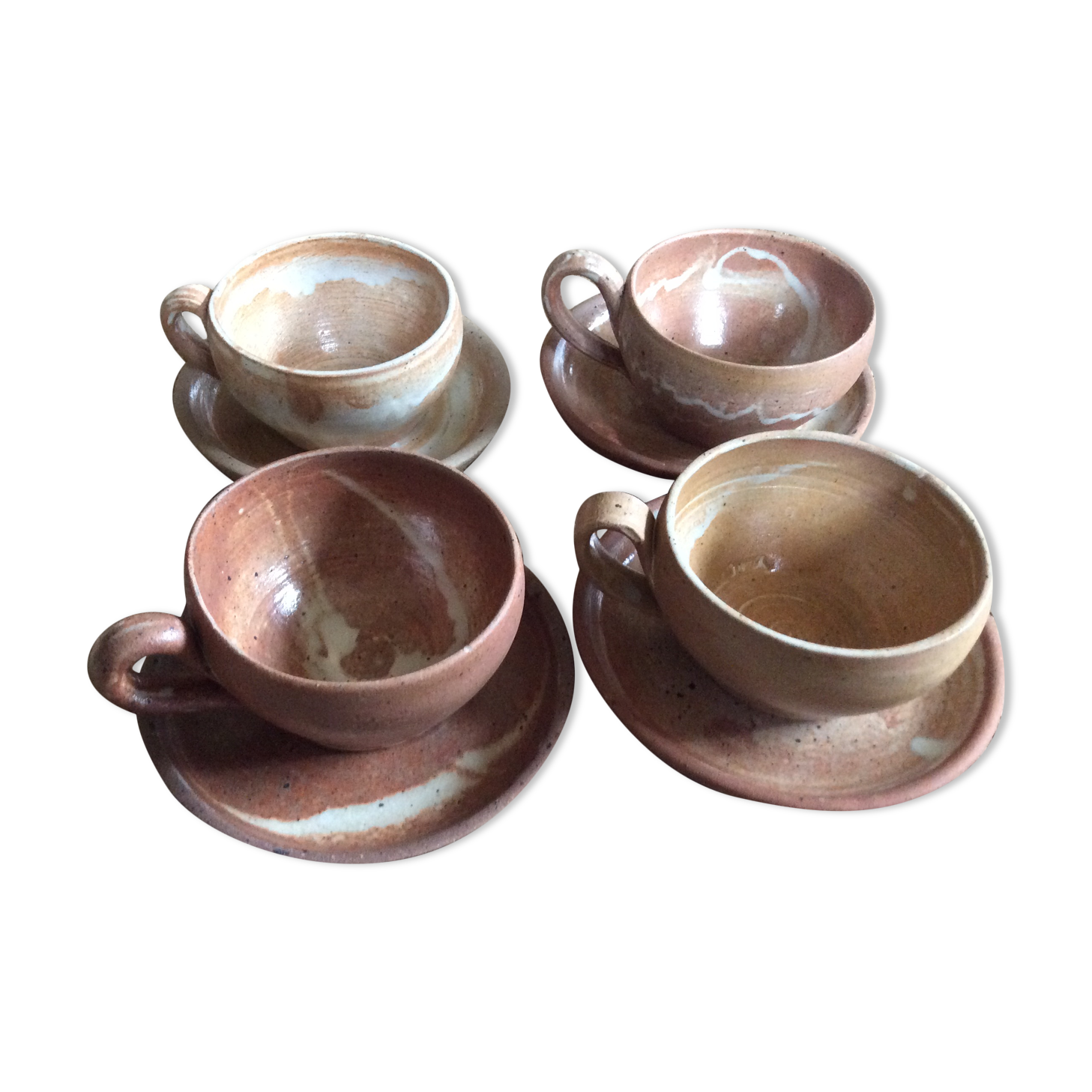 Series of 4 stoneware coffee cups