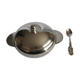 silver metal sugar and silver sugar spoon.