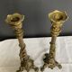 Pair of 19th-century gilded bronze candlesticks in Empire style.