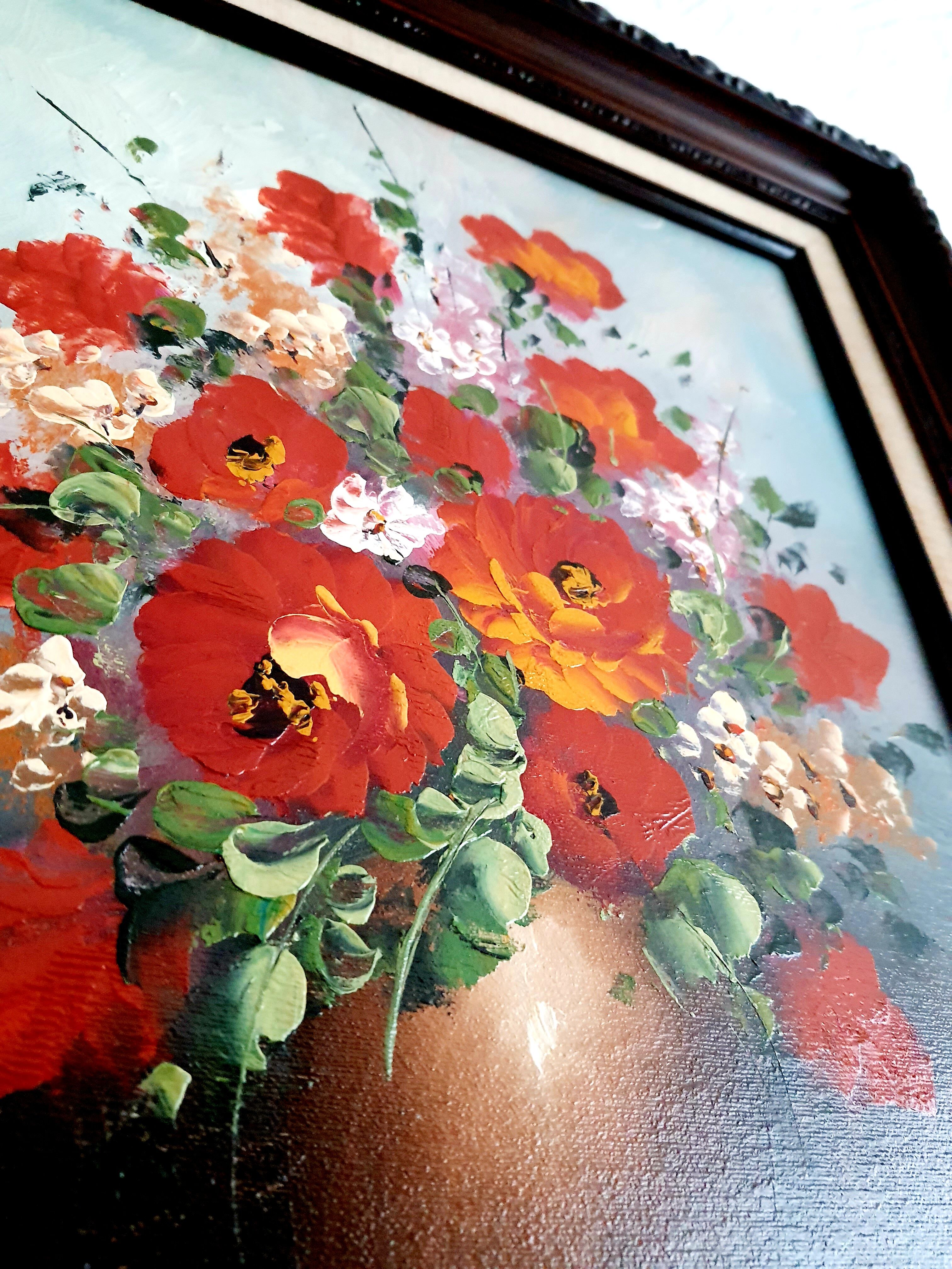 Oil on canvas bouquet of red flowers signed