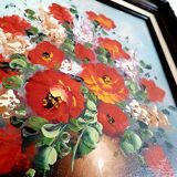 Oil on canvas bouquet of red flowers signed