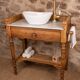 Marble and wood washbasin furniture in Louis-Philippe style.