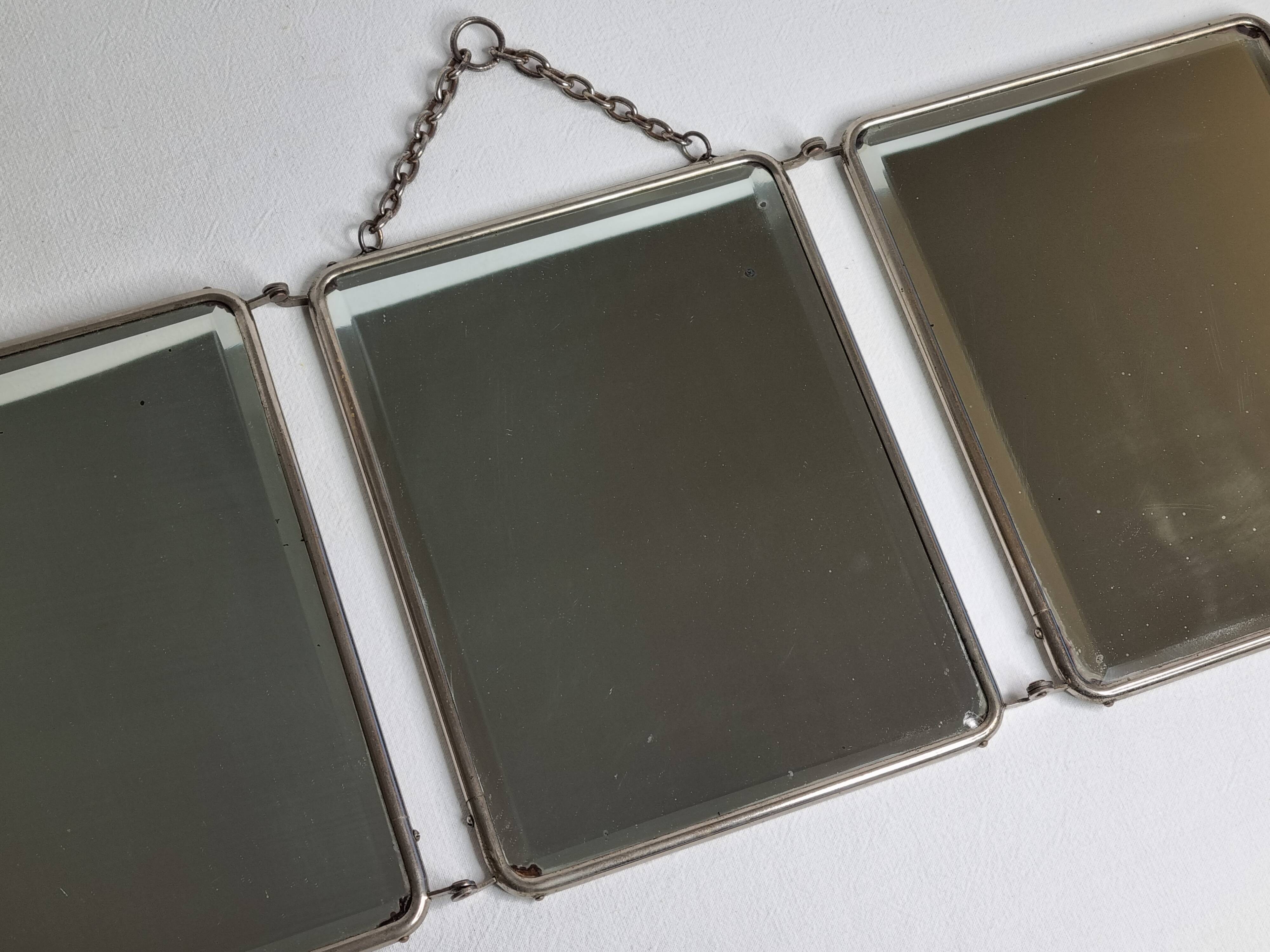 Antique triptych barber's mirror, metal frame and imitation leather back, 1930