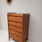 High wooden chest of drawers in the 50s
