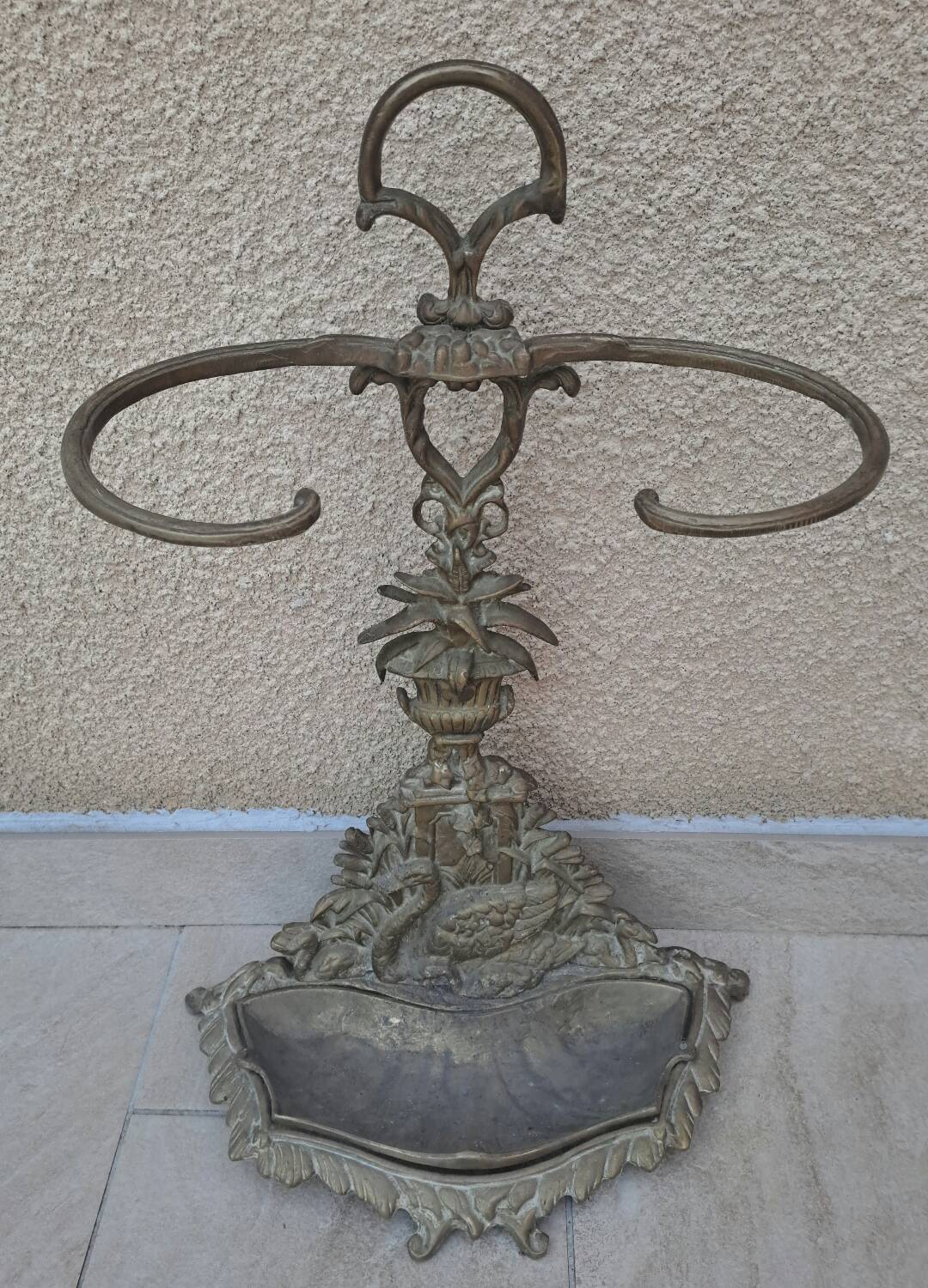 Bronze and brass umbrella stand decorated with a swan