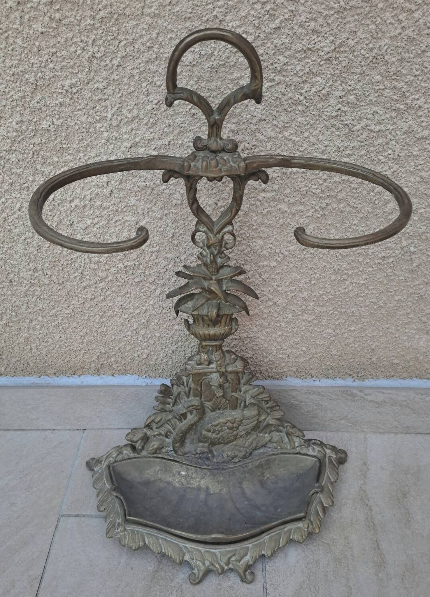 Bronze and brass umbrella stand decorated with a swan