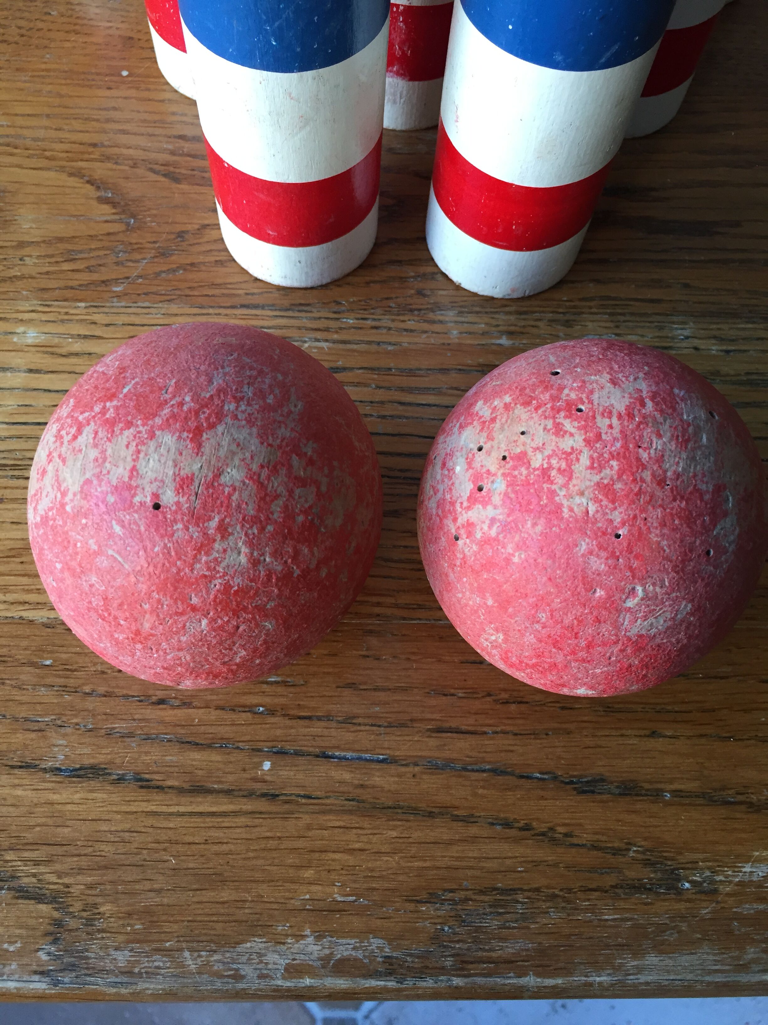 Old vintage wooden bowling game triclore plus two balls