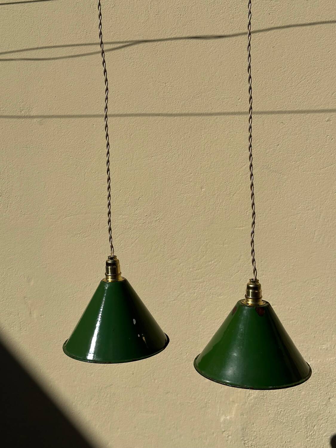 Pair of vintage industrial retro conical enamelled sheet metal pendant lights