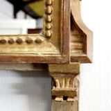 Miroir en bois doré, style Louis XVI – 1ère partie XXe - 60x30cm
