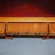 Vintage satin wood partner desk with leather top.