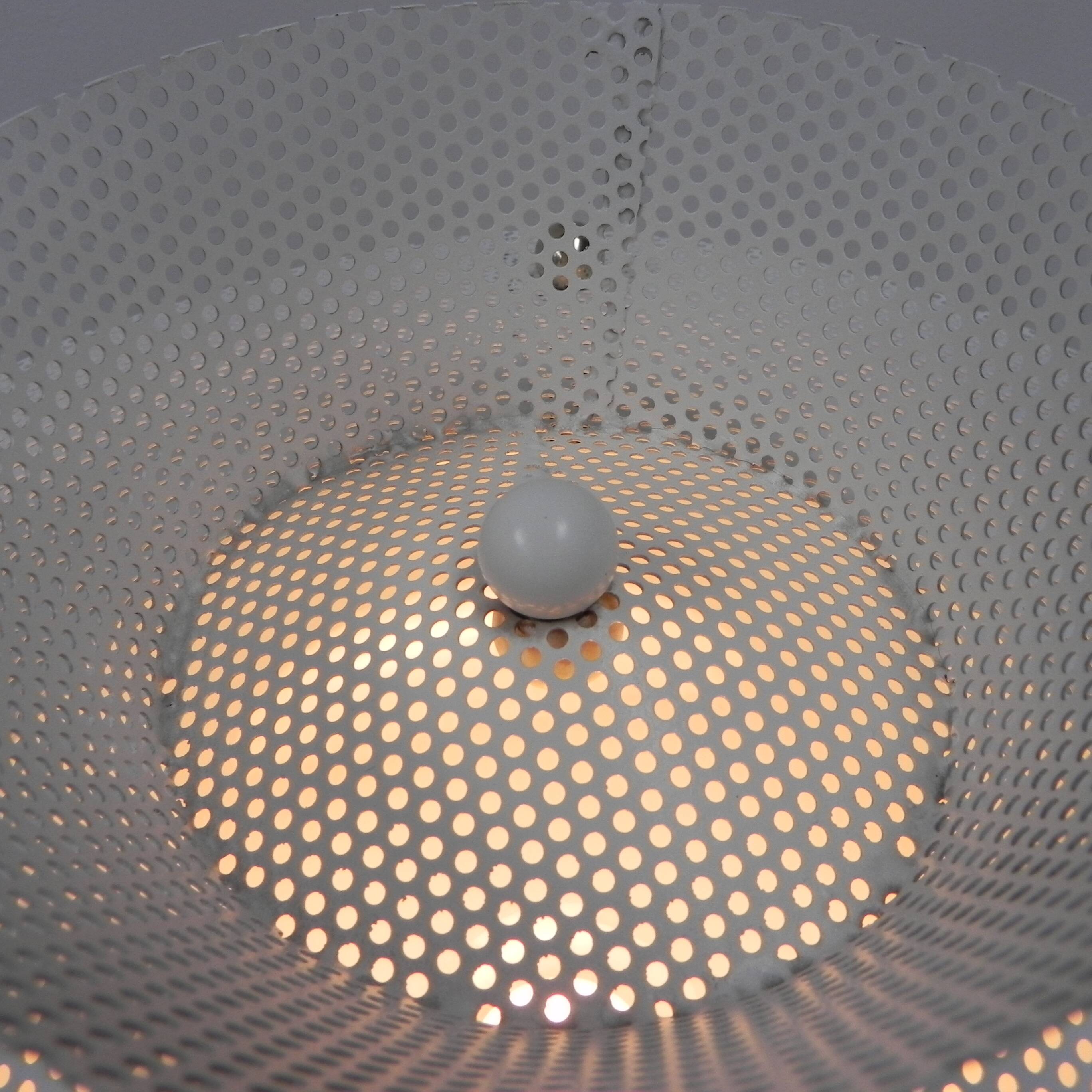 Standing vintage lamp with glass shade and perforated steel shade