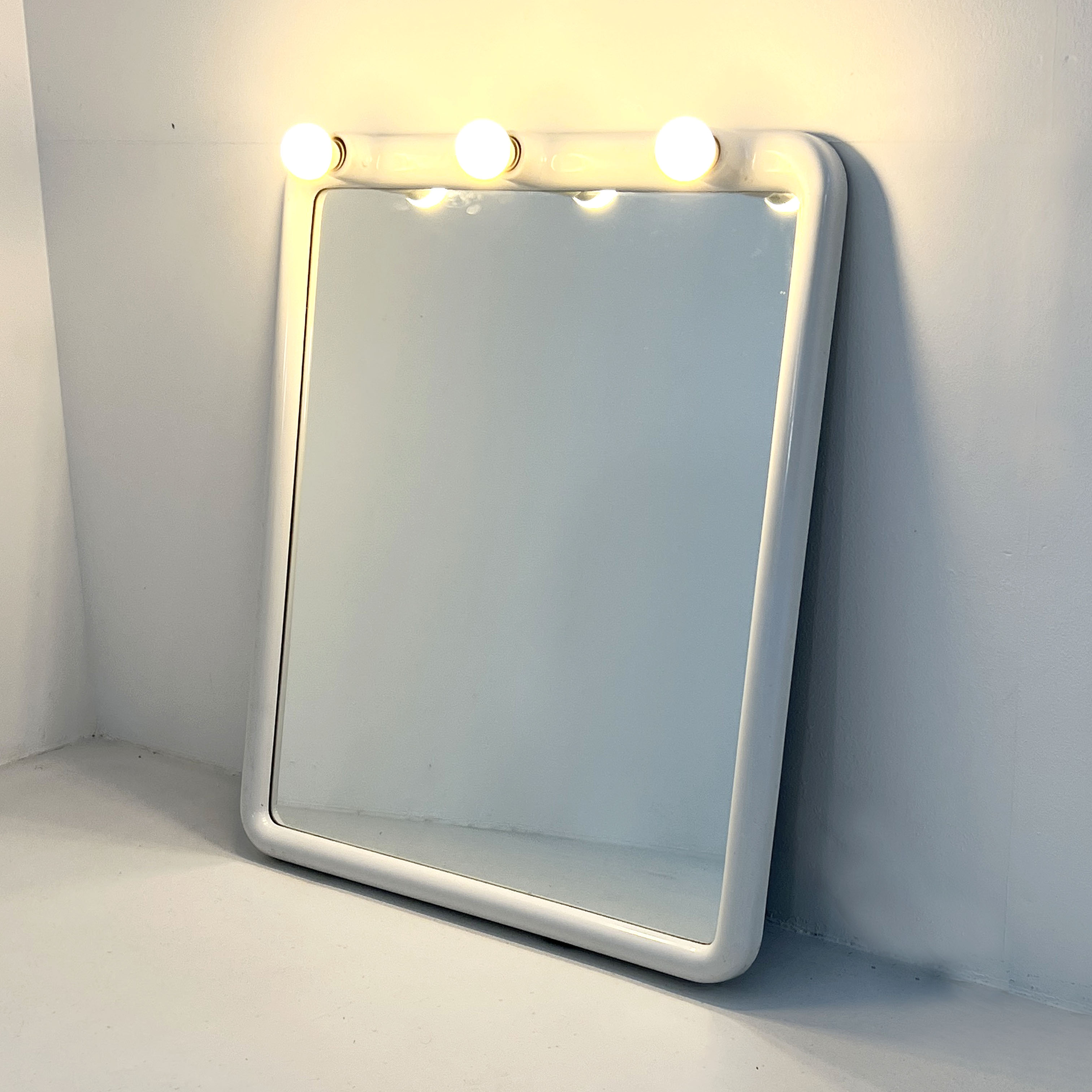 White bulb mirror by carrara & matta, 1970