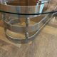 70s design oval coffee table in glass with chrome legs.