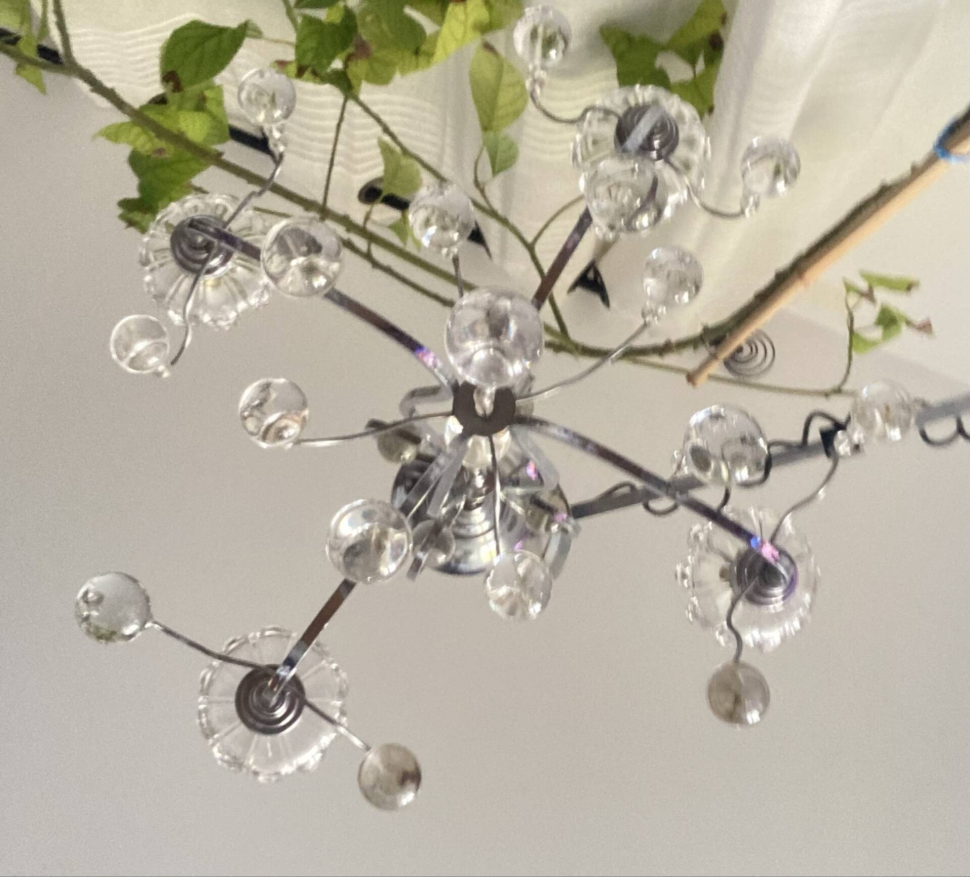 Art Deco chandelier from the early 20th century in chrome brass, with glass pendants.
