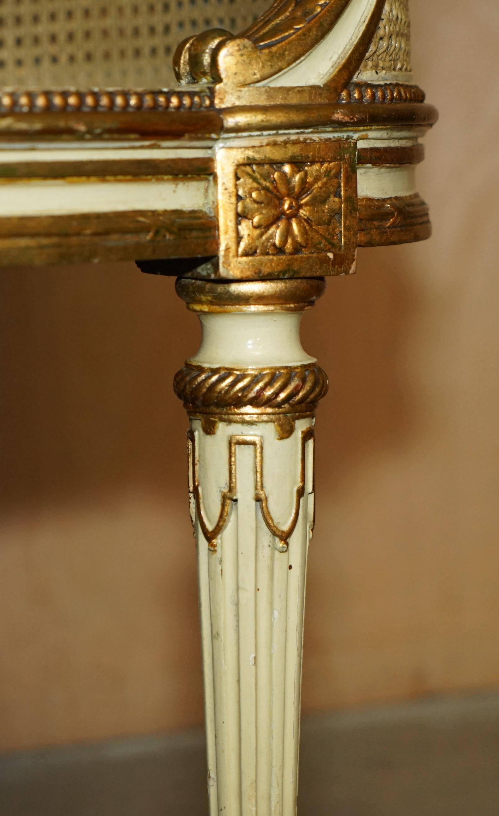 Louis XVI Bergère canapé in gilded wood with double caning