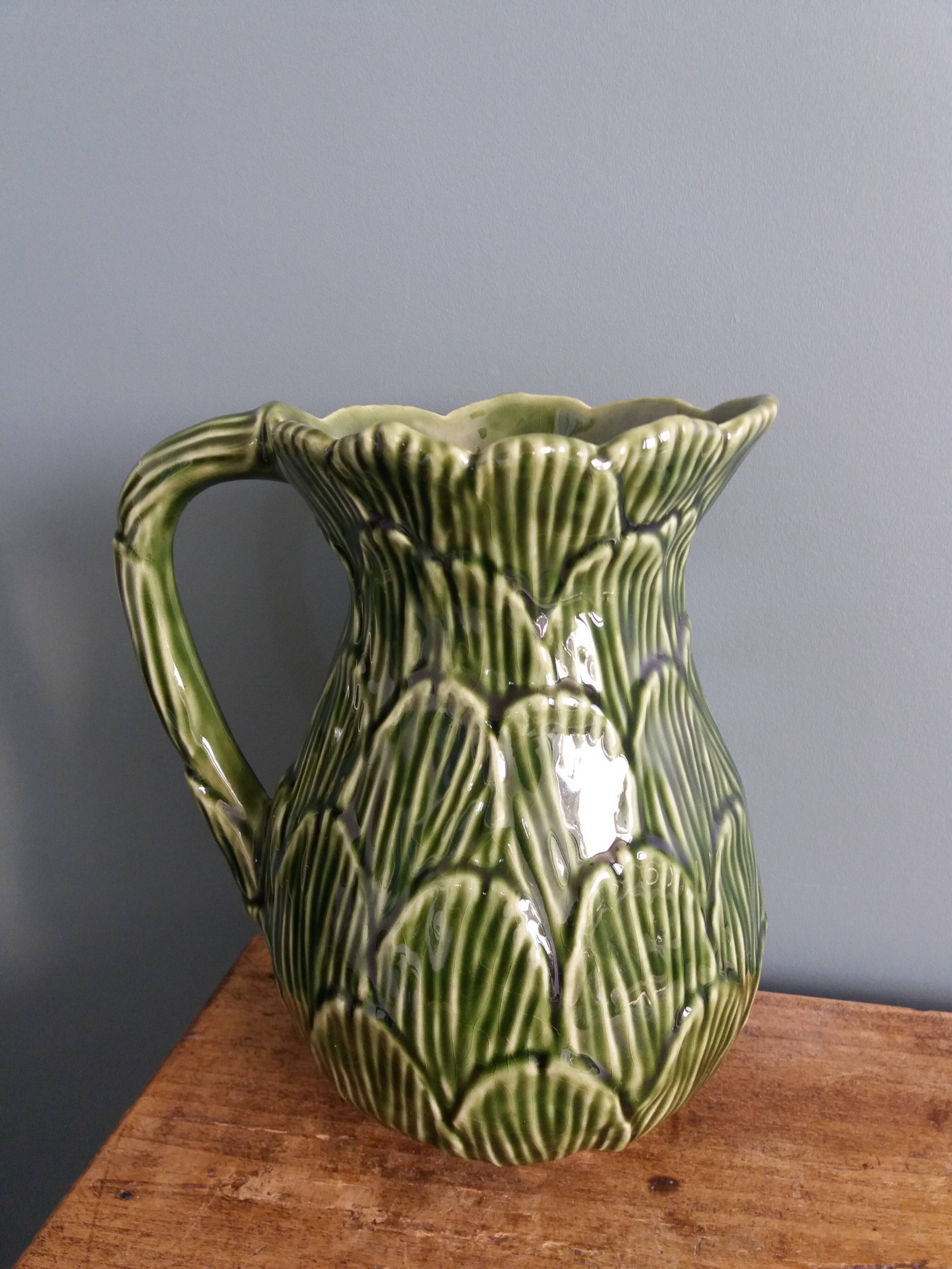 Cabbage pitcher in slip