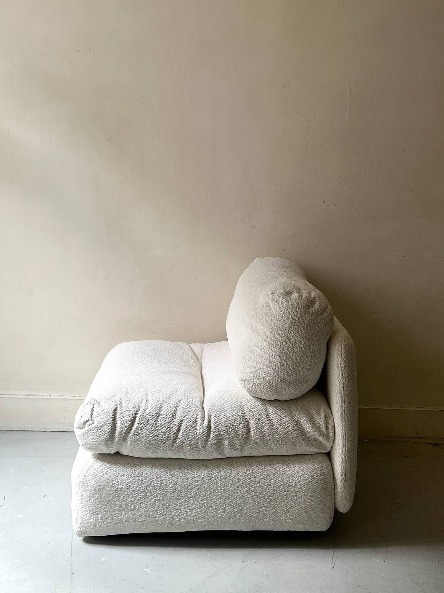2 Italian off-white chenille armchairs with wooden base, 1970s design.