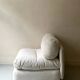 2 Italian off-white chenille armchairs with wooden base, 1970s design.