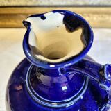 Antique iron-rich earth bottle from Saint Uze, ceramic carafe jug.