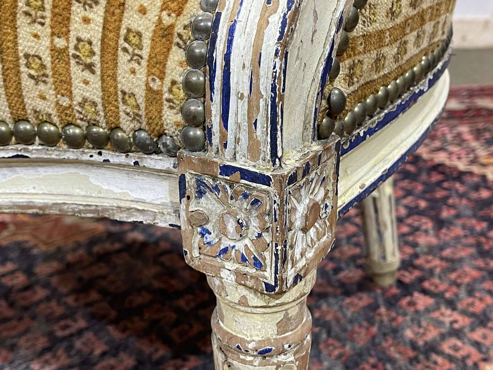 Pair of Louis XVI period cabriolet chairs in beech.