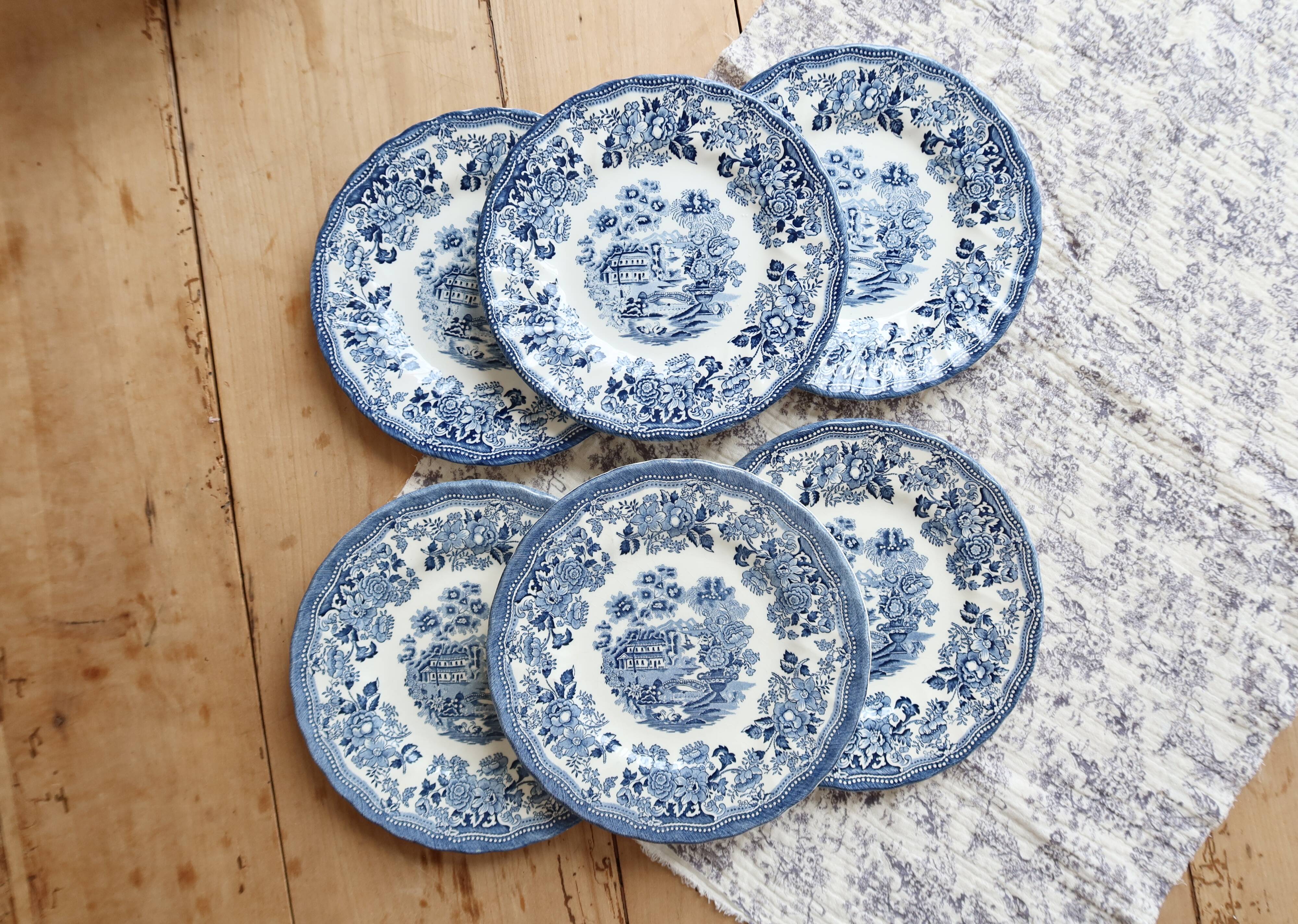 6 English dessert plates by Churchill with a romantic blue design.