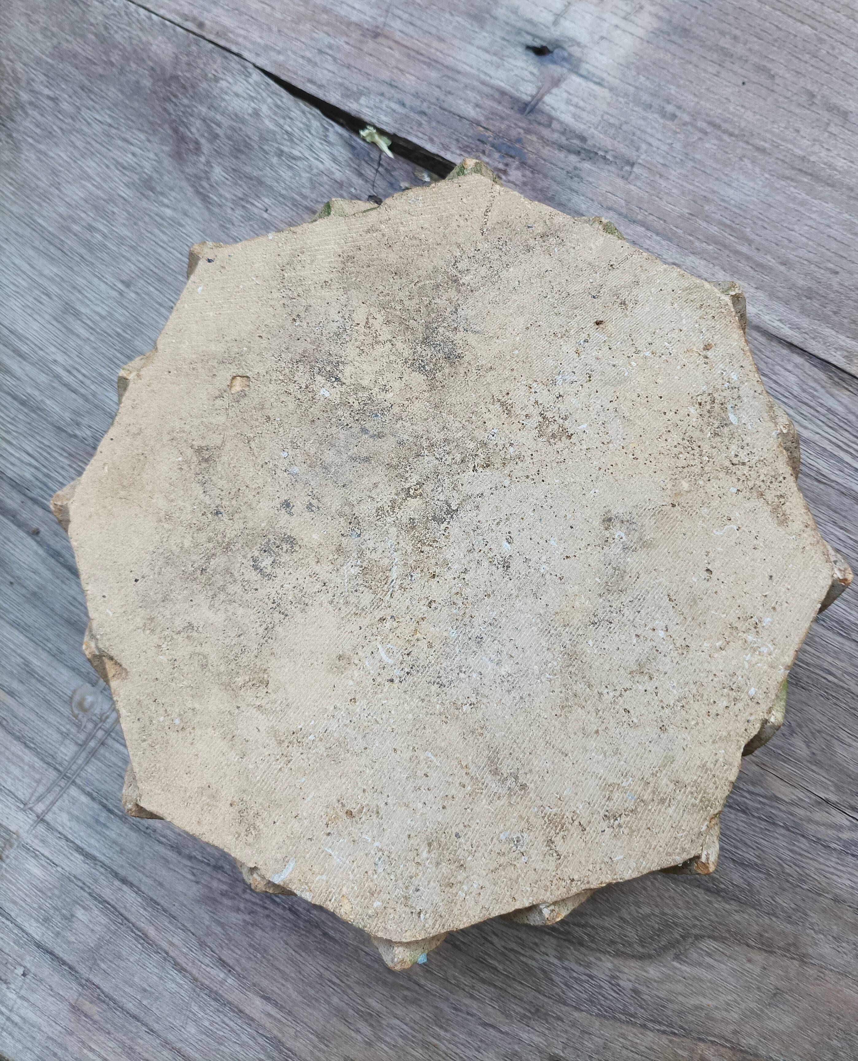 Antique carved stone game board