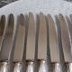 12 silver-plated art deco knives