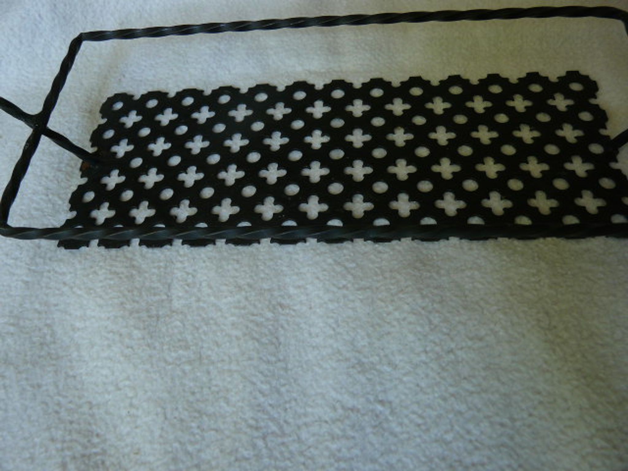 Tray in black perforated metal