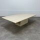 Rectangular travertine coffee table with central leg