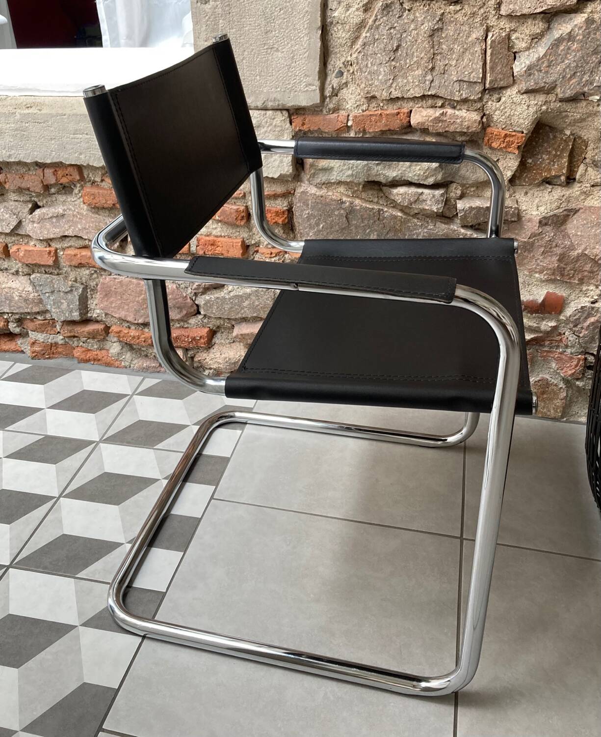 Chrome and black leather armchair type B34