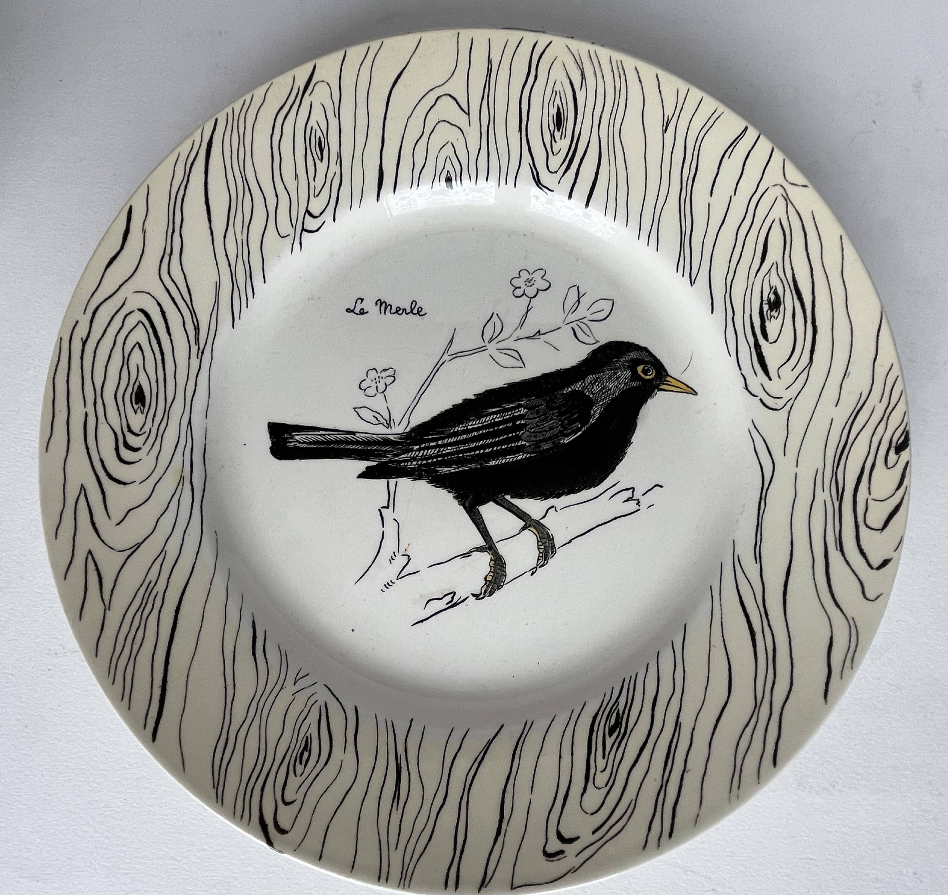 7 antique plates decorated with birds