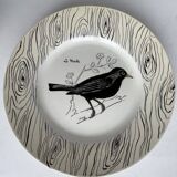 7 antique plates decorated with birds
