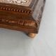 Vintage wooden and antique earthenware trivet, brown tile design