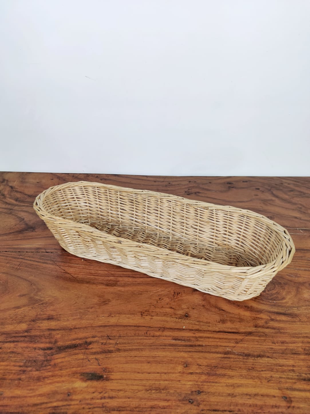 Beige wicker bread basket