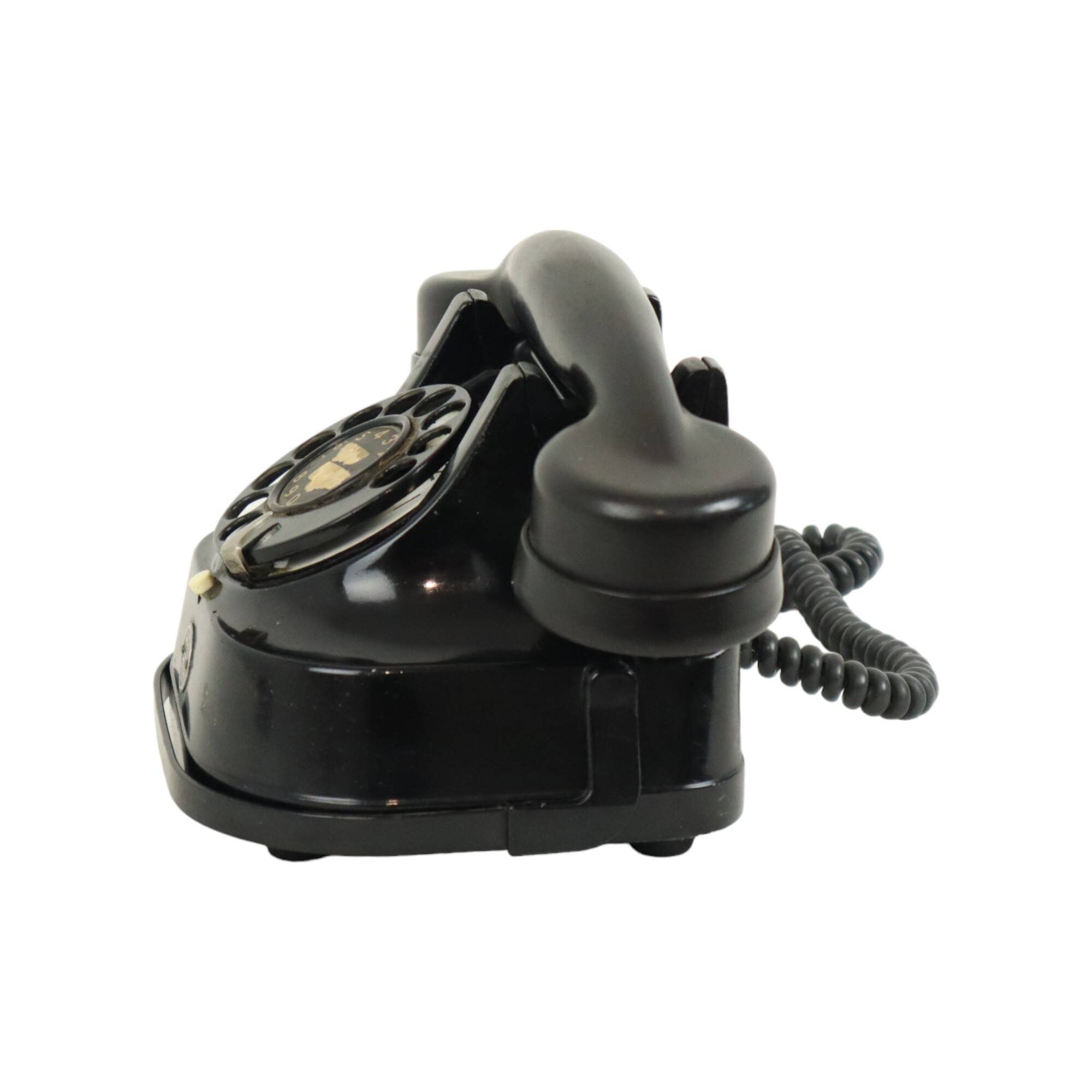Old black telephone with rotary dial metal Bakelite RTT 56B