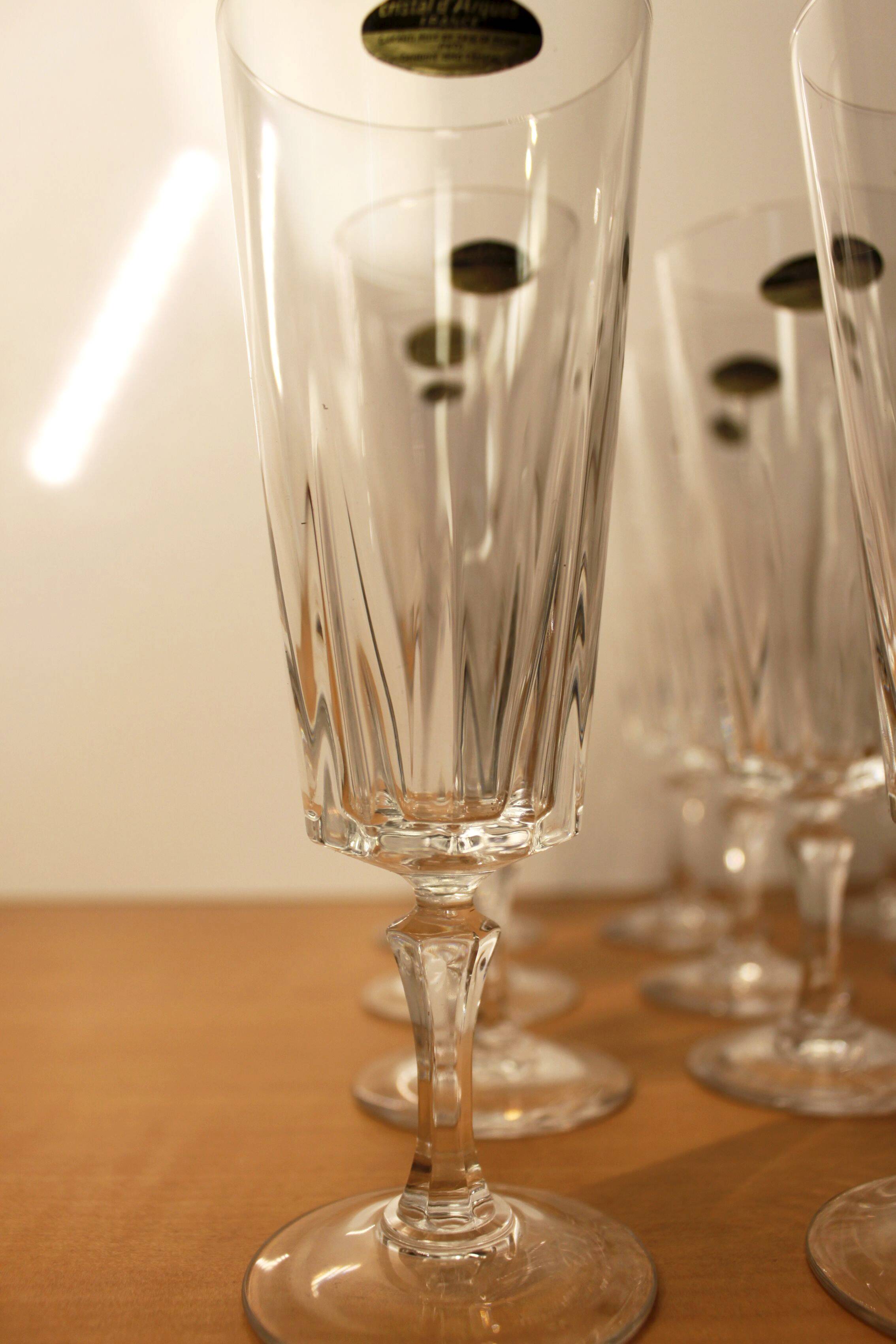 Set of 12 champagne flutes, “Versailles” model, Cristal d'Arques, 70's.