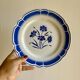 Set of 12 antique flat plates, blue flower decorations