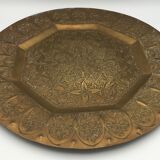Oriental brass tray with chiseled decoration of arabesques and flowers