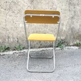 Yellow velvet folding chair