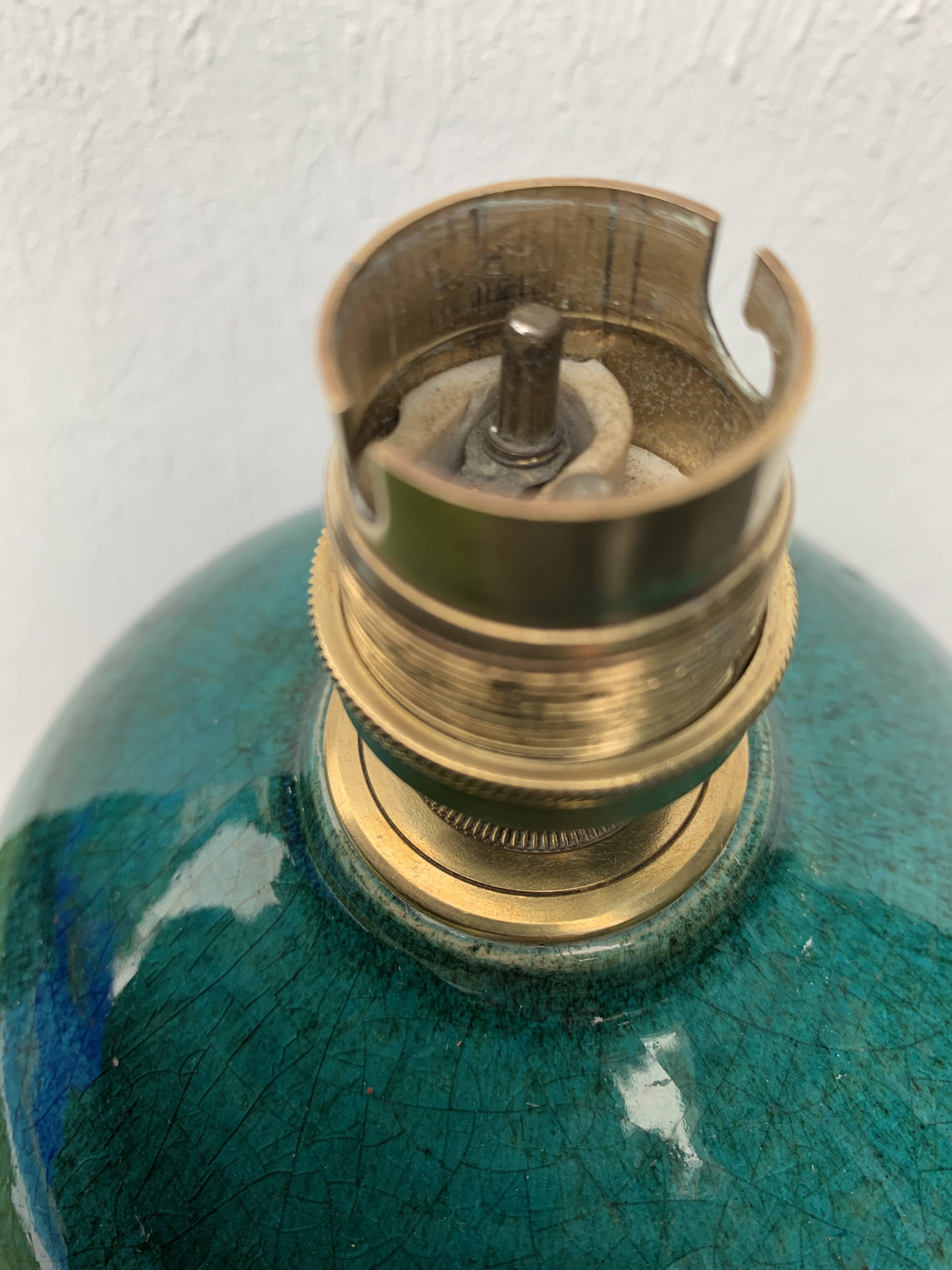 Cracked and signed ceramic ball lamp base, blue-green tones