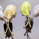 Pair of "vintage" wall lights in brass, perspex, and black bakelite, France Mid-Century