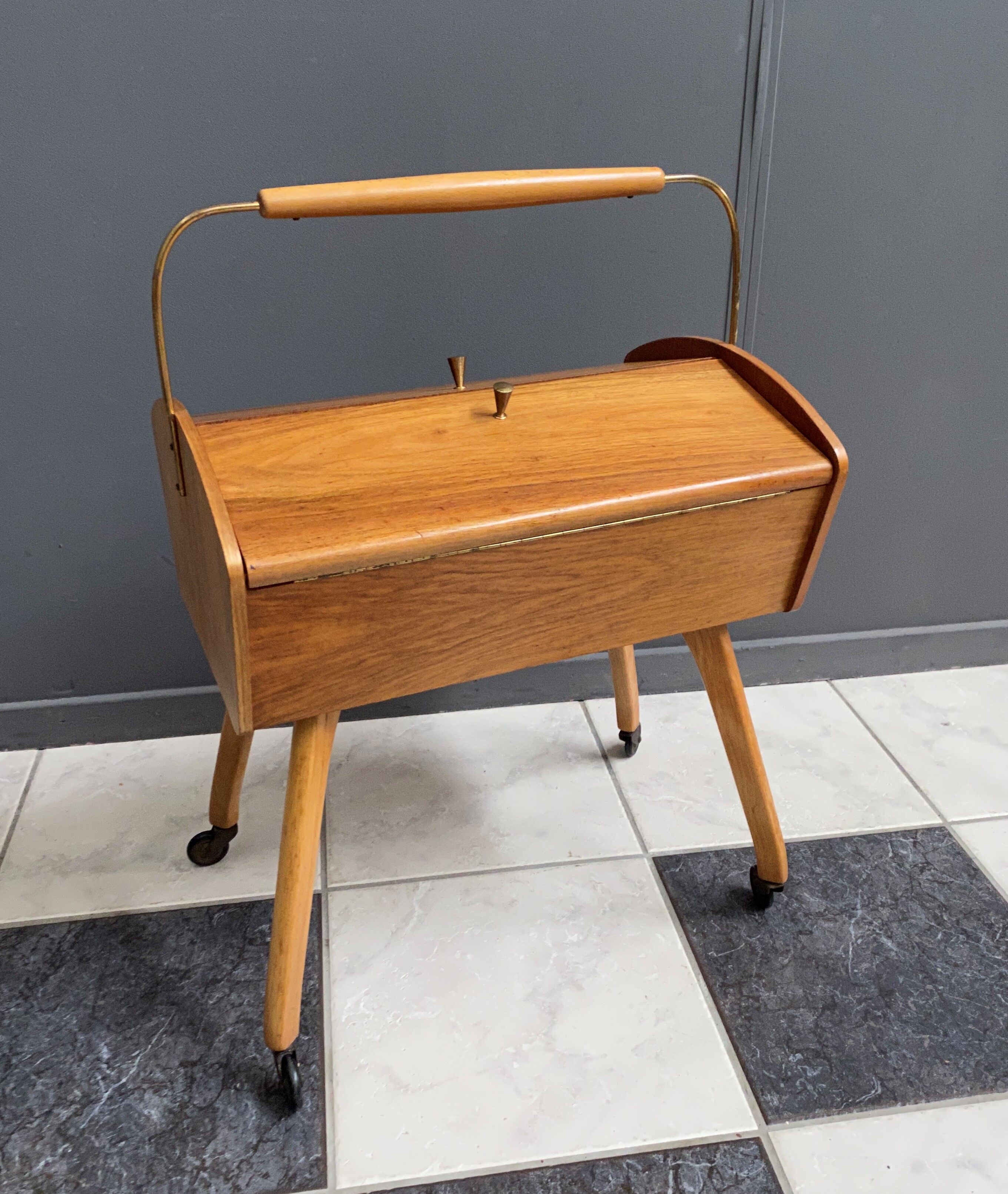 Sewing box on legs and wheels